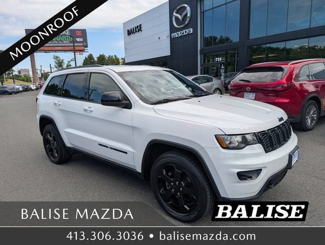 2018 Jeep Grand Cherokee Upland Edition in Bright White Clearcoat — front three-quarter view