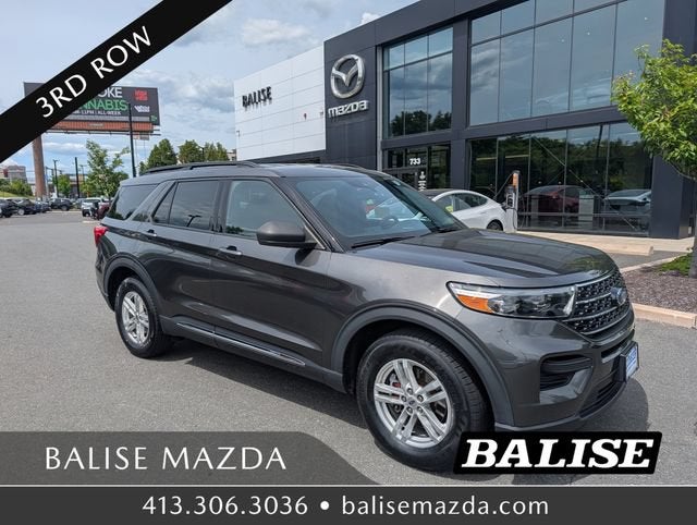 2020 Ford Explorer XLT in Magnetic Metallic — front three-quarter view