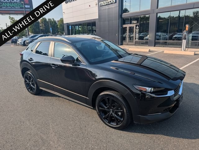 2024 Mazda Mazda CX-30 2.5 S Select Sport in Jet Black Mica — front three-quarter view