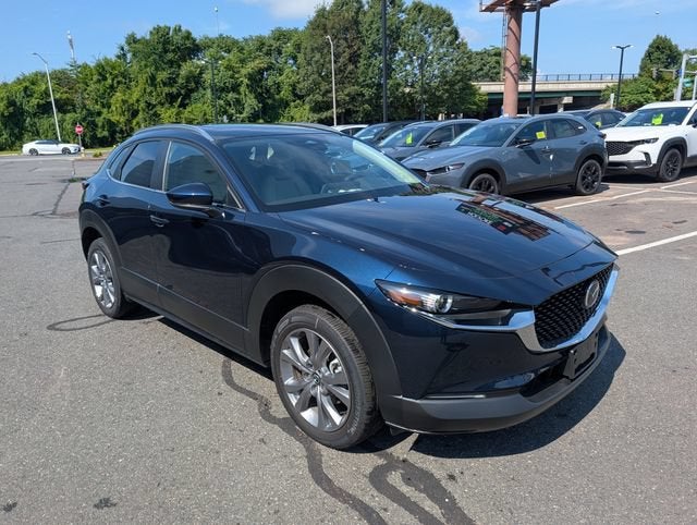 2025 Mazda Mazda CX-30 2.5 S Preferred AWD in Deep Crystal Blue Mica — front three-quarter view