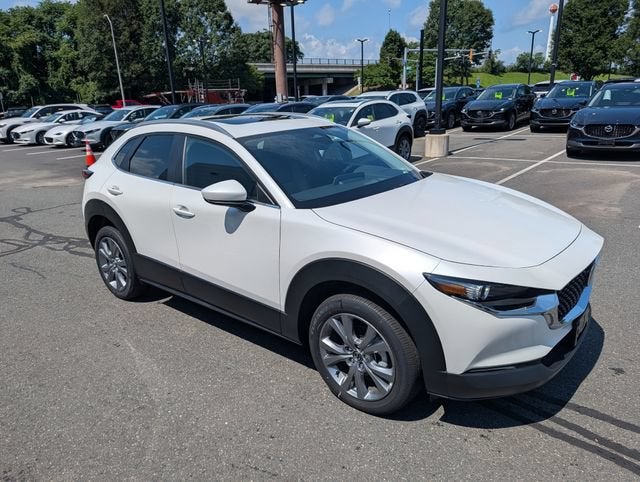 2025 Mazda Mazda CX-30 2.5 S Preferred AWD in Snowflake White Pearl — front three-quarter view