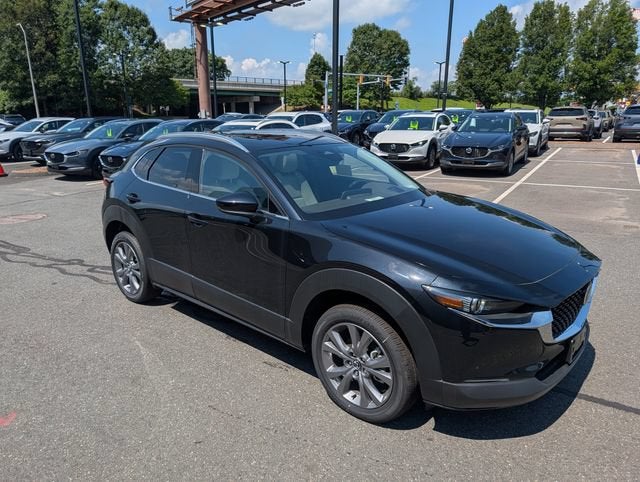 2025 Mazda Mazda CX-30 2.5 S Premium AWD in Jet Black Mica — front three-quarter view