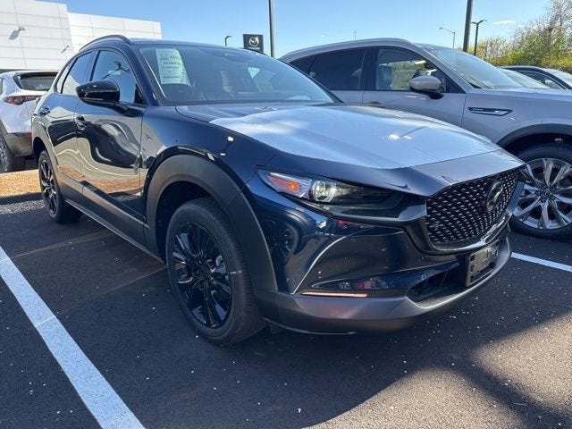 2026 Mazda Mazda CX-30 2.5 Turbo Premium Plus AWD in Deep Crystal Blue Mica — front three-quarter view