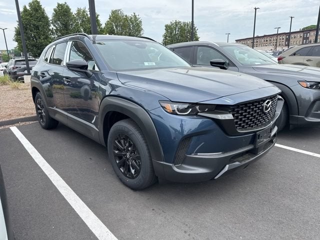 2026 Mazda Mazda CX-50 Hybrid Premium AWD in Ingot Blue Metallic — front three-quarter view