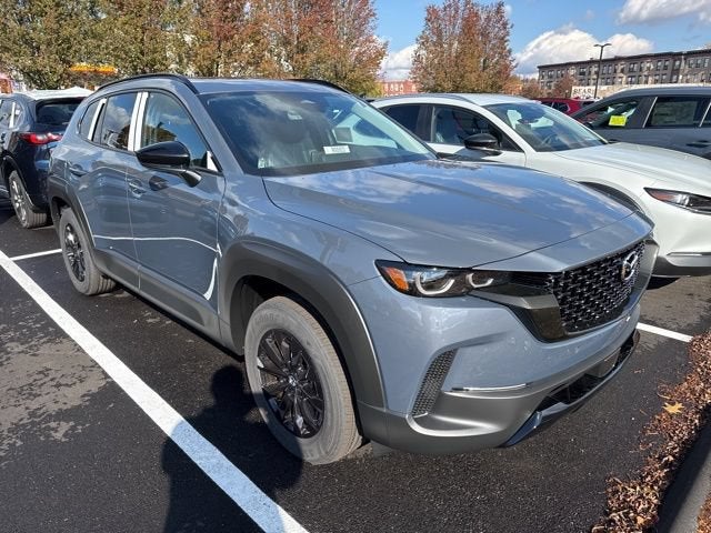 2026 Mazda Mazda CX-50 Hybrid Premium AWD in Polymetal Gray Metallic — front three-quarter view