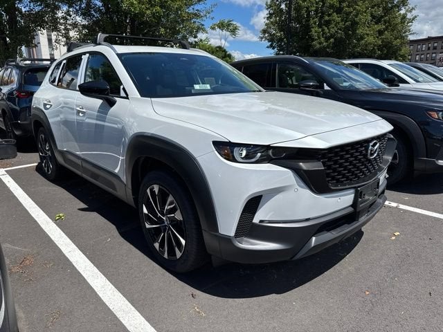 2026 Mazda Mazda CX-50 Hybrid Premium Plus AWD in Wind Chill Pearl — front three-quarter view