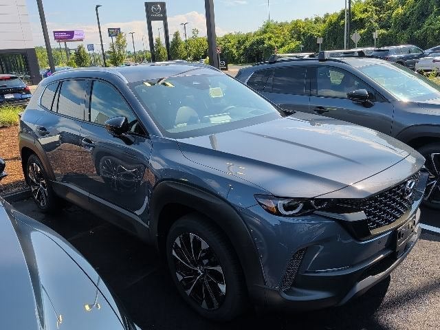2026 Mazda Mazda CX-50 Hybrid Premium Plus AWD in Polymetal Gray Metallic — front three-quarter view