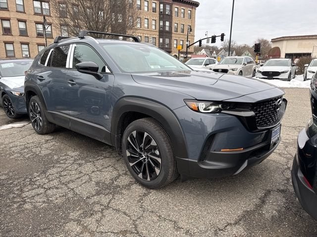 2026 Mazda Mazda CX-50 Hybrid Premium Plus AWD in Polymetal Gray Metallic — front three-quarter view