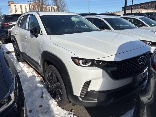 2026 Mazda Mazda CX-50 Hybrid Premium Plus AWD in Wind Chill Pearl — front three-quarter view
