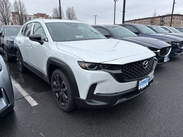 2026 Mazda Mazda CX-50 2.5 S Premium AWD in Wind Chill Pearl — front three-quarter view