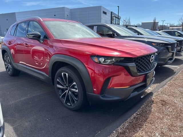 2026 Mazda Mazda CX-50 2.5 S Premium AWD in Soul Red Crystal Metallic — front three-quarter view
