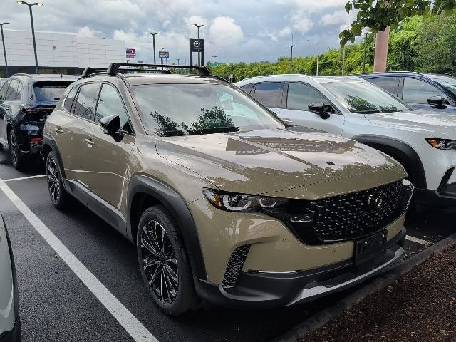 2026 Mazda Mazda CX-50 2.5 Turbo Premium Plus AWD in Zircon Sand Metallic — front three-quarter view