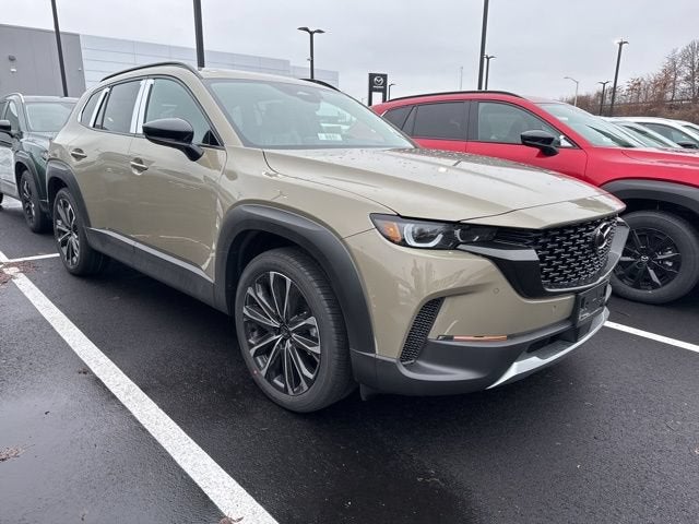 2026 Mazda Mazda CX-50 2.5 Turbo Premium Plus AWD in Zircon Sand Metallic — front three-quarter view