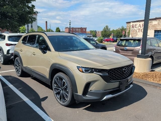 2026 Mazda Mazda CX-50 2.5 Turbo Premium Plus AWD in Zircon Sand Metallic — front three-quarter view
