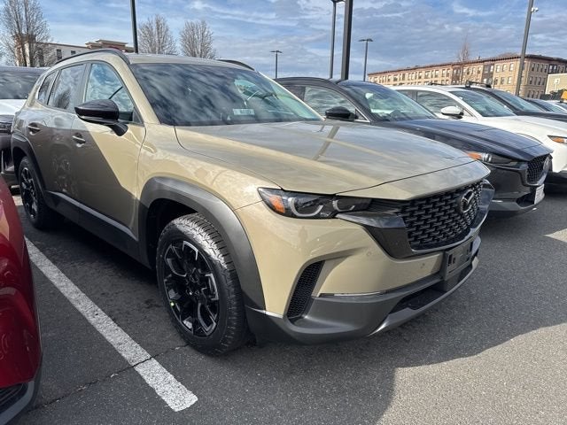 2026 Mazda Mazda CX-50 2.5 S Meridian Edition AWD in Zircon Sand Metallic — front three-quarter view