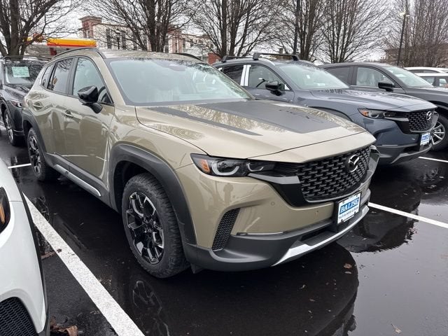 2026 Mazda Mazda CX-50 2.5 Turbo Meridian Edition AWD in Zircon Sand Metallic — front three-quarter view
