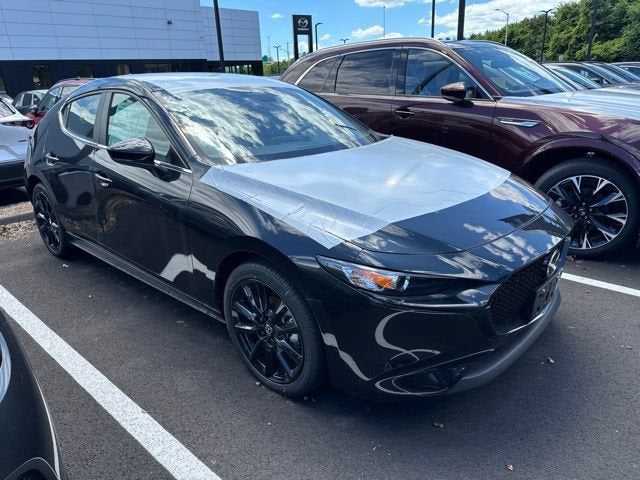 2026 Mazda Mazda3 Hatchback 2.5 S Select Sport in Jet Black Mica — front three-quarter view