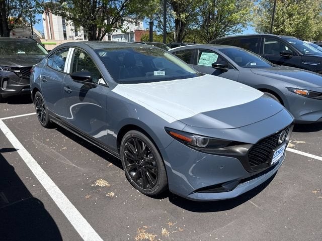 2026 Mazda Mazda3 Sedan 2.5 Turbo Premium Plus AWD in Polymetal Gray Metallic — front three-quarter view