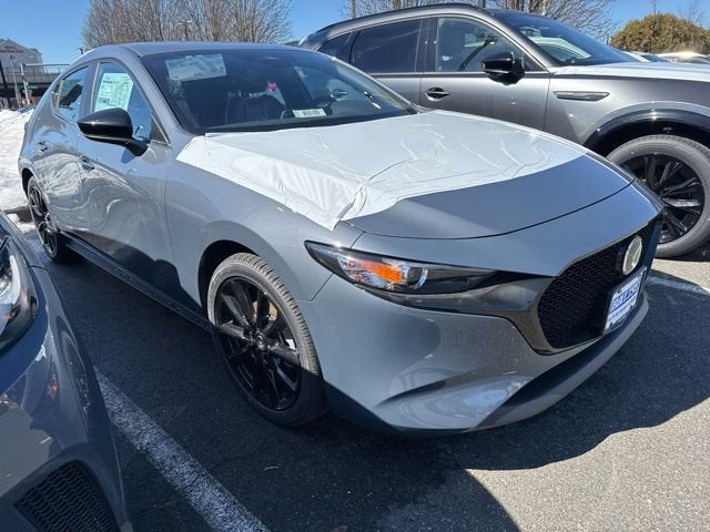 2026 Mazda Mazda3 Hatchback 2.5 S Carbon Edition AWD in Polymetal Gray Metallic — front three-quarter view