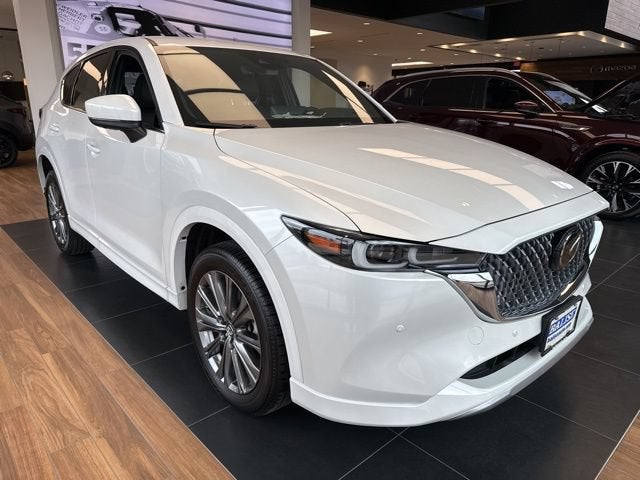 2025 Mazda Mazda CX-5 2.5 Turbo Signature AWD in Rhodium White Metallic — front three-quarter view