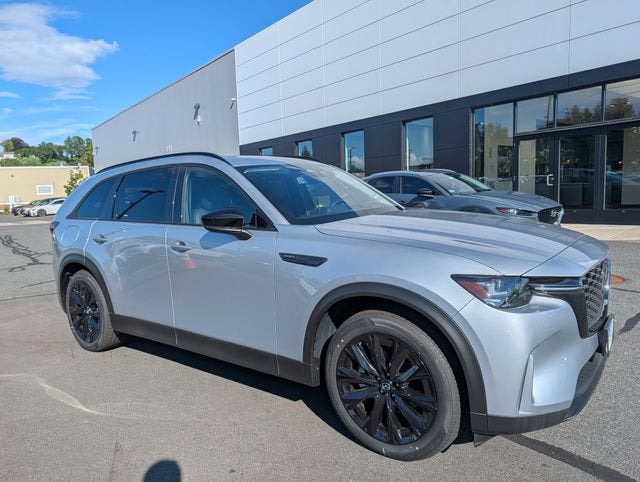 2025 Mazda Mazda CX-90 Plug-In Hybrid Premium Sport AWD in Sonic Silver Metallic — front three-quarter view