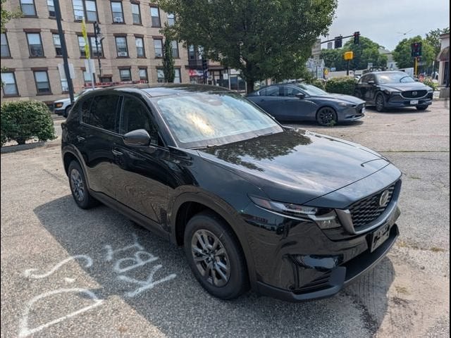 2026 Mazda Mazda CX-5 2.5 S Select AWD in Jet Black Mica — front three-quarter view