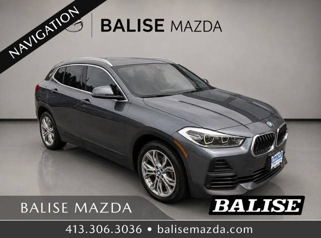 2021 BMW X2 xDrive28i in Mineral Grey Metallic — front three-quarter view
